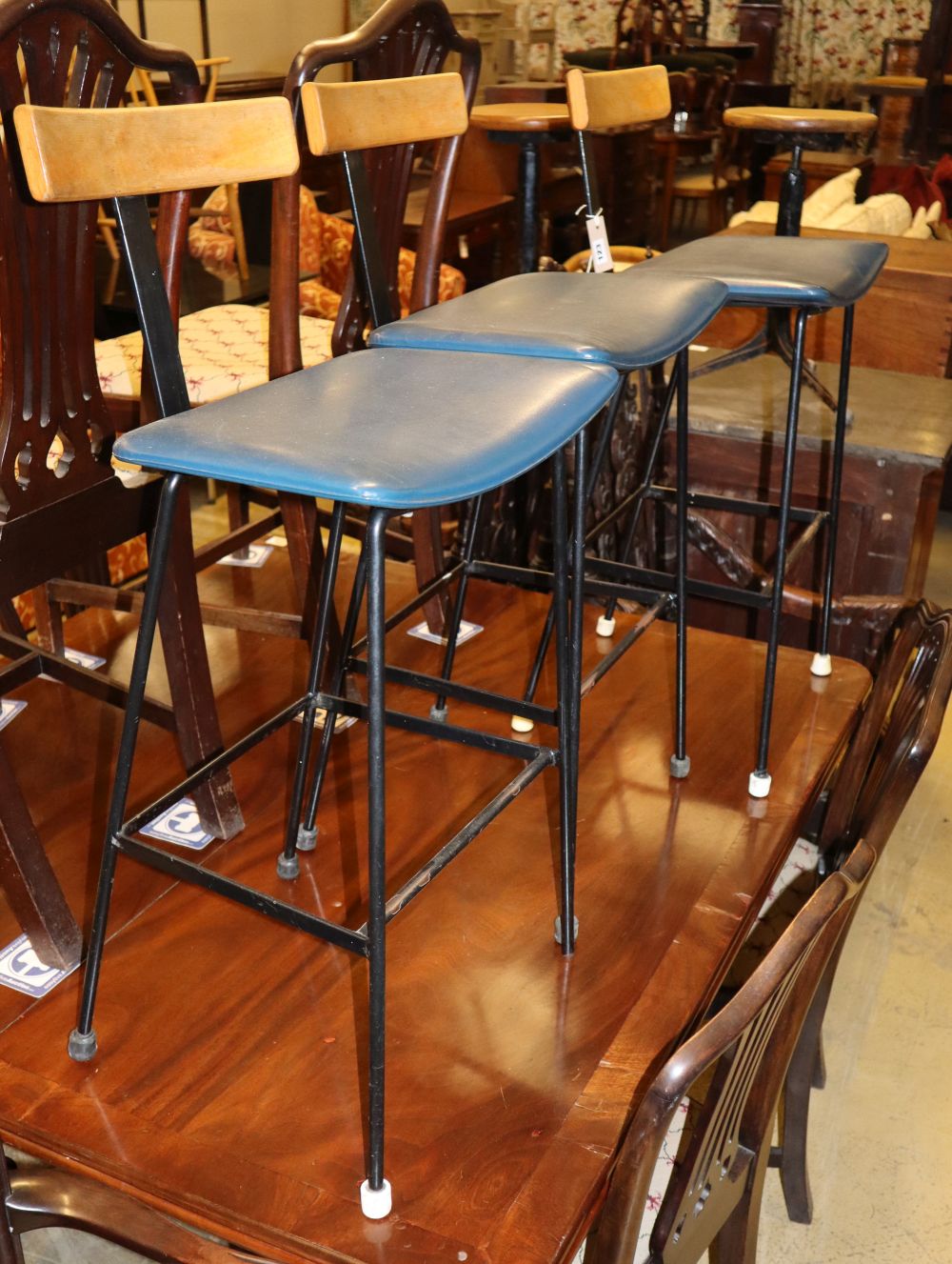 Three blue seated bar / breakfast stools, W.43cm, D.36cm, H.87cm